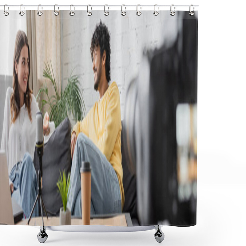 Personality  Charming Brunette Woman And Curly Indian Man In Yellow Jumper Talking On Couch Near Microphone And Blurred Paper Cup With Flowerpot While Recording Podcast On Blurred Digital Camera, Banner Shower Curtains