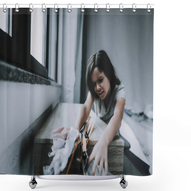 Personality  Sad Girl Sits At Table Has Probem With Homework. Portrait Of Little Dark-Haired Child In Gray T-shirt Standing Near Desk Next To Window And Scoops Up Things Ling On Table Shower Curtains