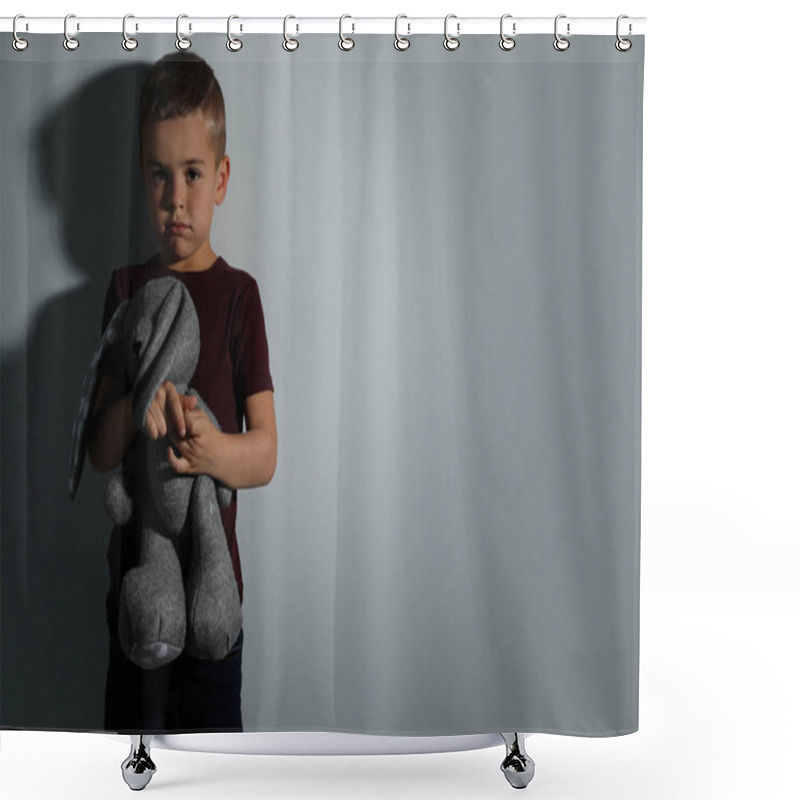 Personality  Sad Little Boy With Toy Near White Wall, Space For Text. Domesti Shower Curtains