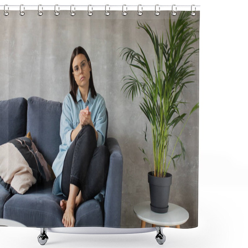 Personality  A Young Woman Is Sitting On The Sofa Looking At The Camera. The Girl Is Worried, Sad. Depression. Shower Curtains