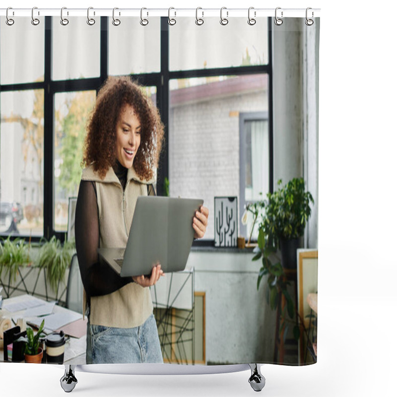 Personality  A Young Woman Smiles While Interacting With Her Laptop In A Chic Workspace Filled With Plants. Shower Curtains