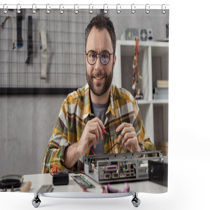 Personality  Smiling Man Looking At Camera While Using Multimeter Over Broken Pc Shower Curtains