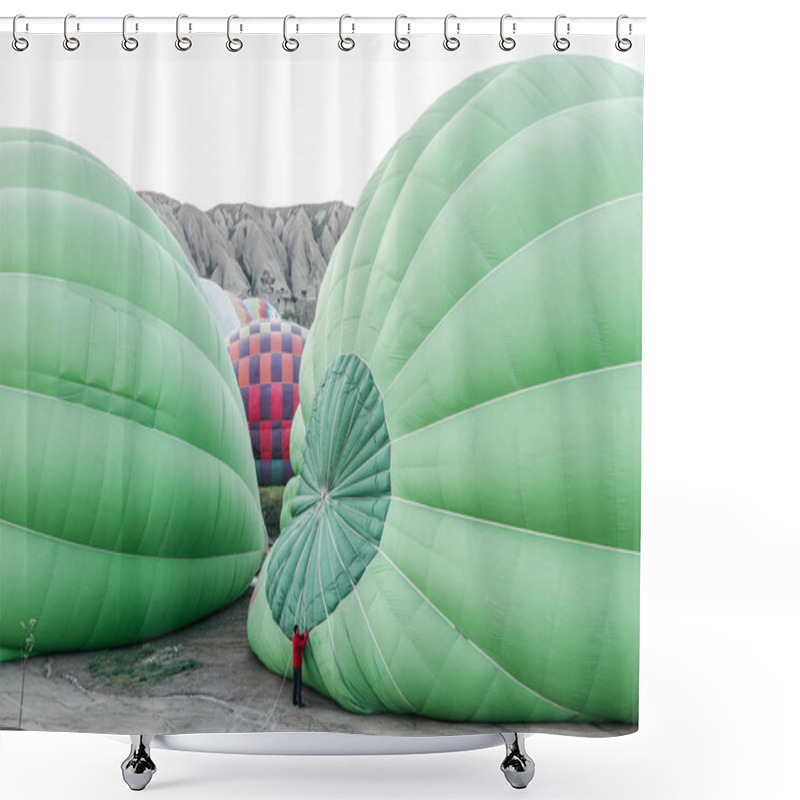 Personality  CAPPADOCIA, TURKEY - 09 MAY, 2018: High Angle View Of Man Working With Hot Air Balloons In Cappadocia, Turkey Shower Curtains