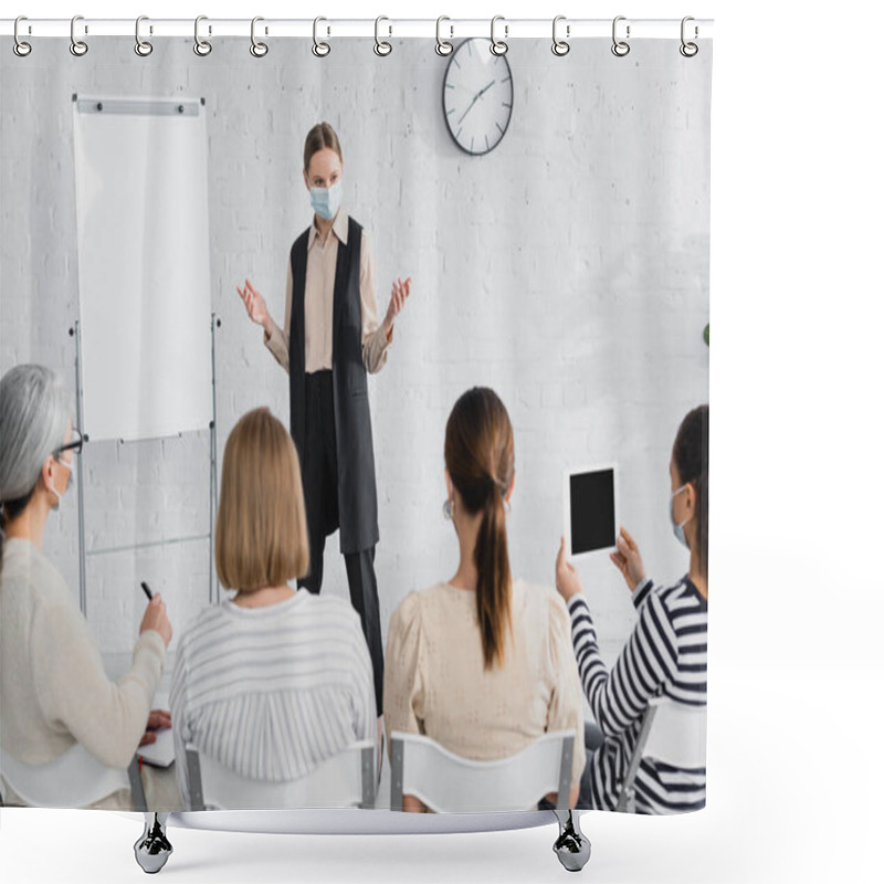 Personality  Speaker In Medical Mask Standing And Gesturing While Looking At Interracial Businesswomen On Blurred Foreground Shower Curtains