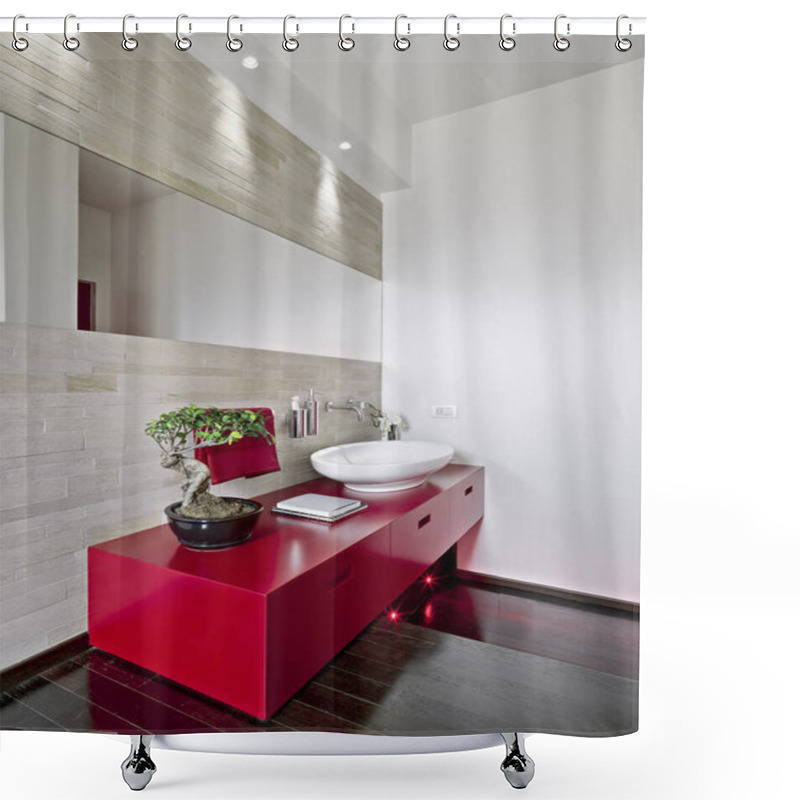 Personality  Interior Shot Of A Modern Bathroom In Foreground The Red Washbasin Cabinet The Floor Is Made Of Wood Shower Curtains