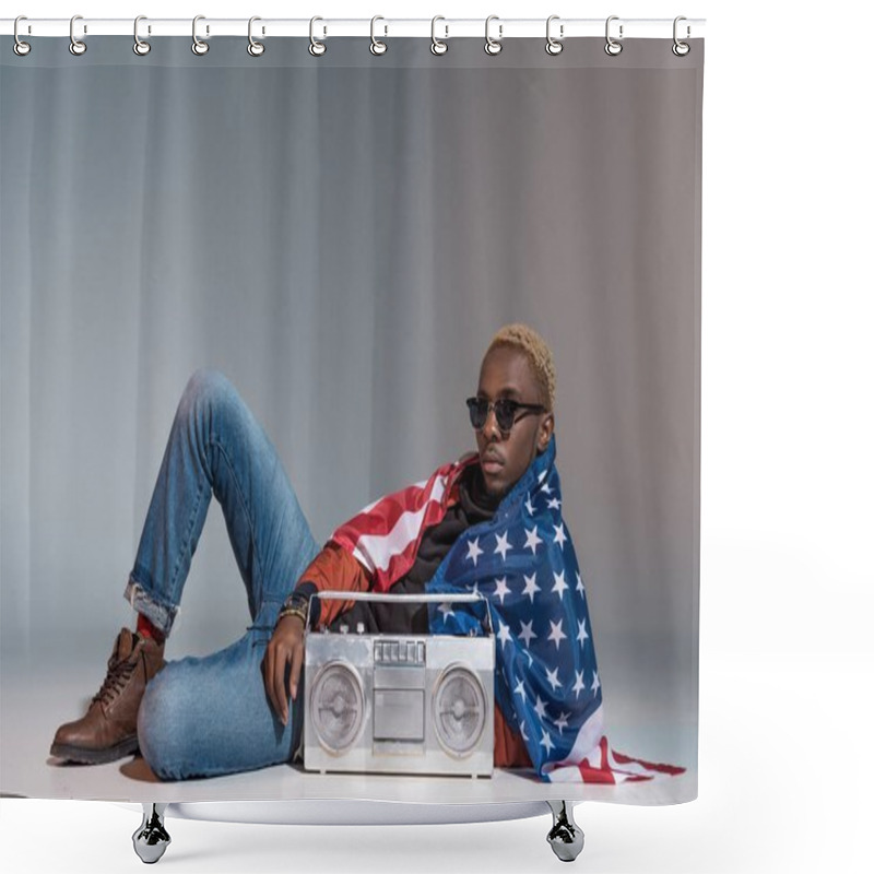 Personality  Young African American Man With Us Flag On Shoulders Lying With Silver Tape Recorder On Grey Shower Curtains