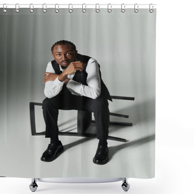 Personality  A Young African American Man In A Suit, Exuding Confidence While Seated On A Unique Chair Against A Grey Background. Shower Curtains