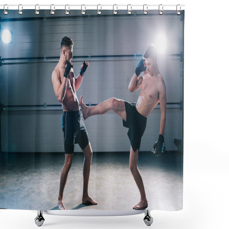 Personality  Side View Of Muscular Barefoot Mma Fighter Kicking Sportive Opponent With Leg Shower Curtains