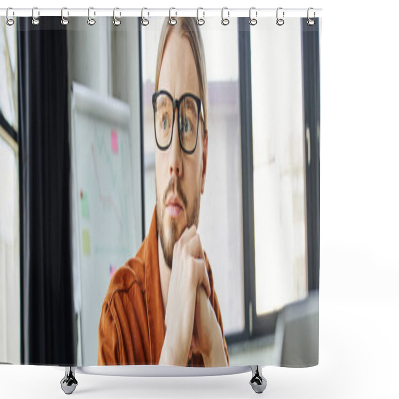 Personality  Portrait Of Serious And Thoughtful Bearded Businessman In Eyeglasses And Trendy Shirt Holding Hands Under Chin And Looking Away Near Flip Chart On Blurred Background In Office, Banner Shower Curtains