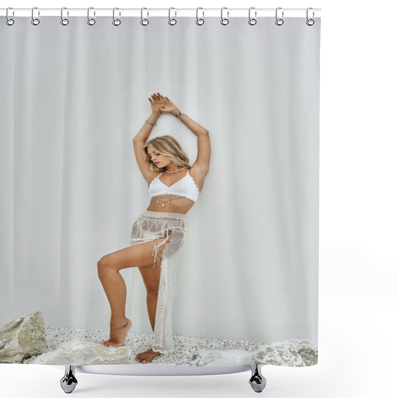 Personality  A Young Woman In A White Bikini Top And A Long, Crocheted Skirt Poses Against A Grey Wall With Rocks At Her Feet. Shower Curtains