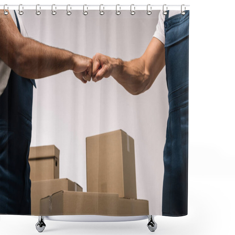 Personality  Cropped View Of Workers Bumping Fists Near Boxes On Grey Shower Curtains