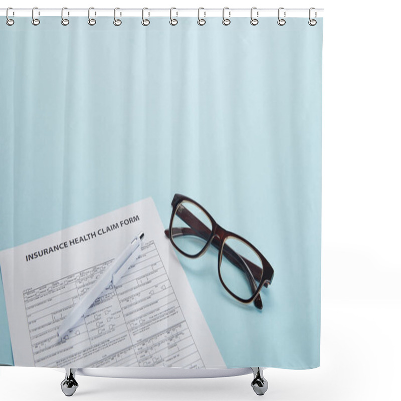 Personality  Close-up View Of Insurance Health Claim Form, Pen And Eyeglasses On Blue Shower Curtains