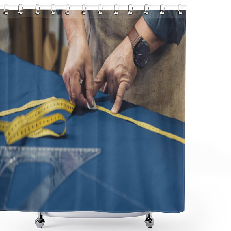 Personality  Cropped Image Of Male Craftsman In Apron Making Measurements On Fabric At Workshop Shower Curtains