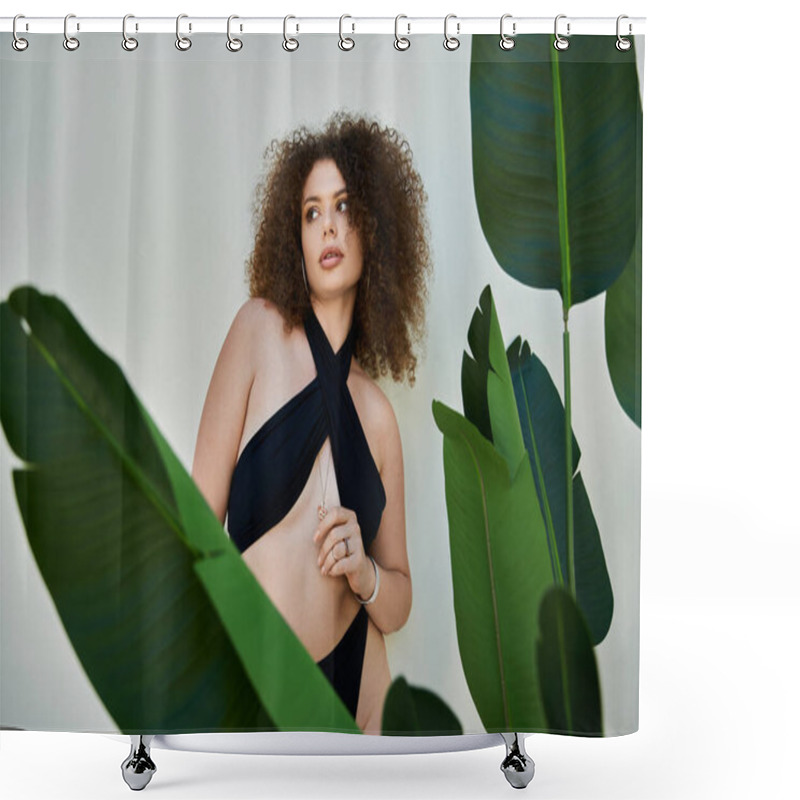 Personality  A Beautiful Woman With Curly Hair Poses In A Black Swimsuit Against A White Wall, Framed By Lush Green Foliage. Shower Curtains