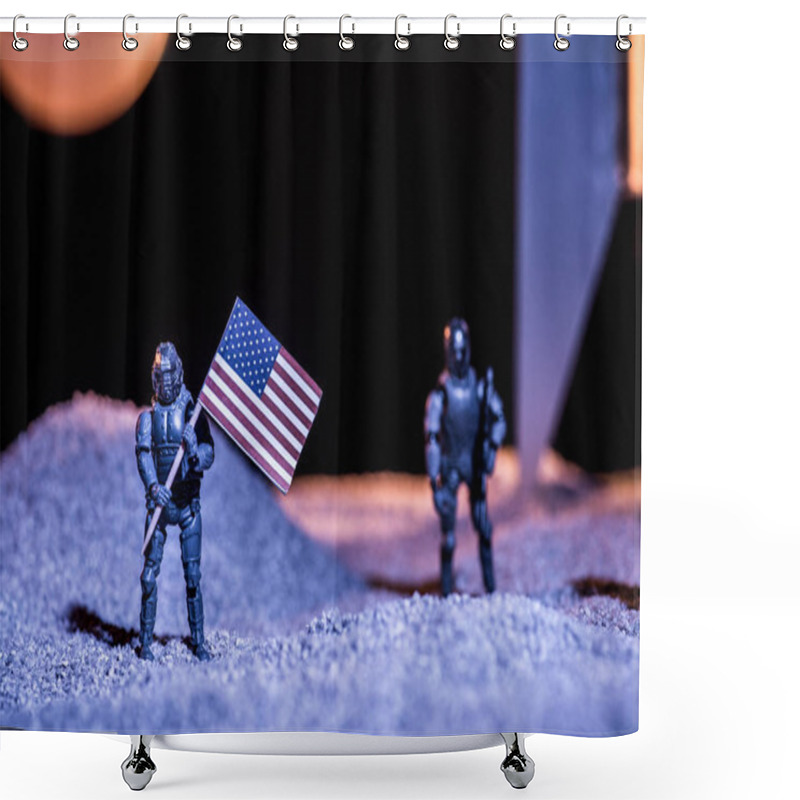 Personality  Selective Focus Of Toy Astronauts Holding American Flag In Space  Shower Curtains