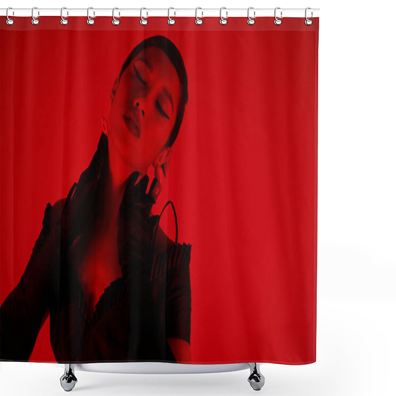 Personality  Stylish And Trendy Asian Woman With Bold Makeup And Closed Eyes Posing In Long Black Gloves And Cocktail Dress On Vibrant Background With Red Lighting Effect, Spring Fashion Concept Shower Curtains