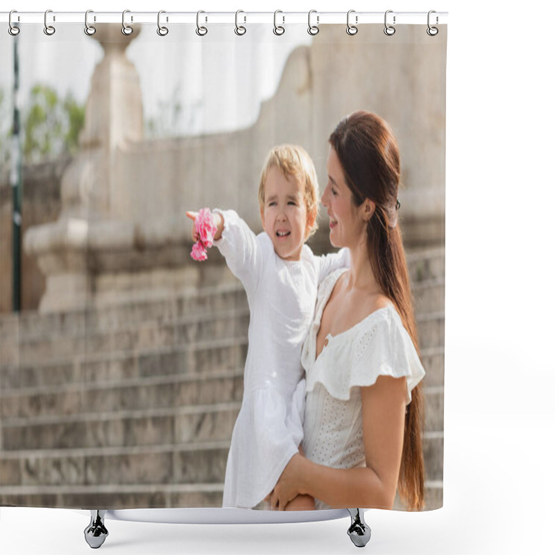 Personality  Cheerful Baby Girl Holding Flowers And Pointing With Finger Near Mom In Summer Dress In Valencia Shower Curtains