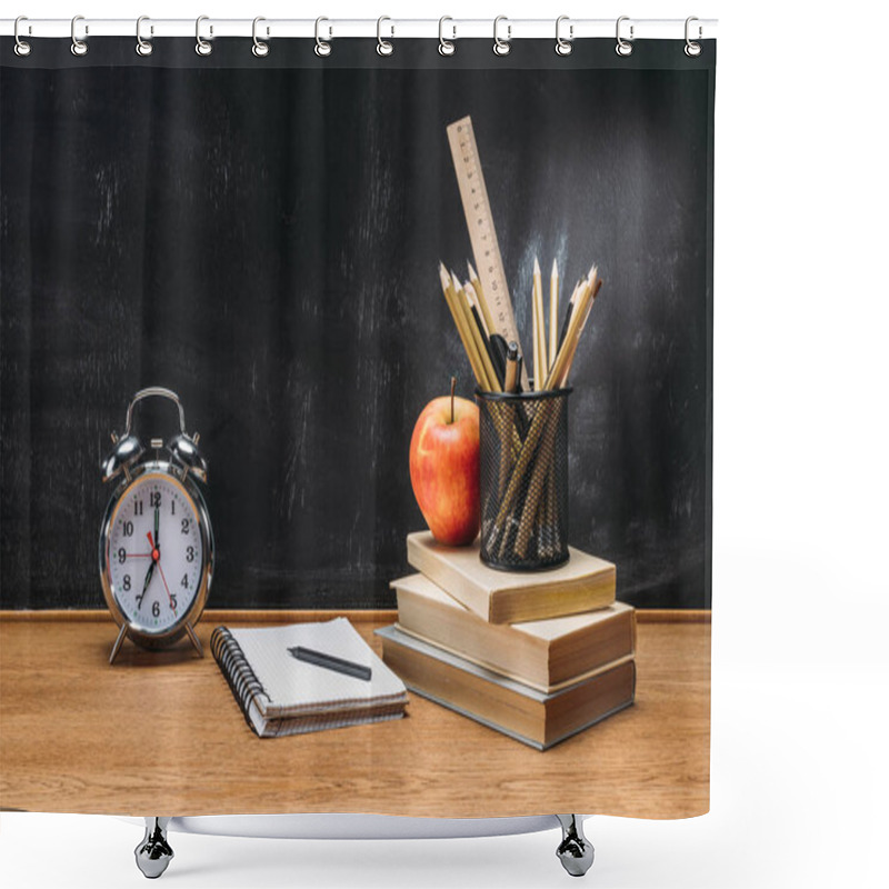 Personality  Close Up View Of Fresh Apple, Clock, Notebook, Pencils And Books On Wooden Tabletop With Empty Blackboard Behind Shower Curtains