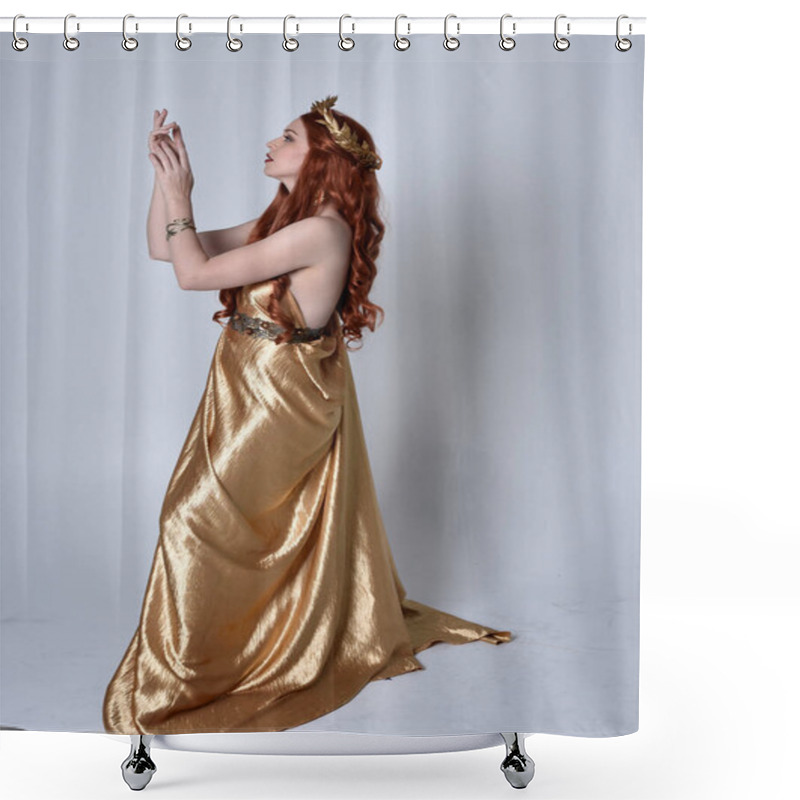 Personality  Full Length Portrait Of Girl With Red Hair Wearing Long Grecian Toga And Golden Wreath. Standing Pose In Side Profile,  Isolated Against A Grey Studio Background. Shower Curtains