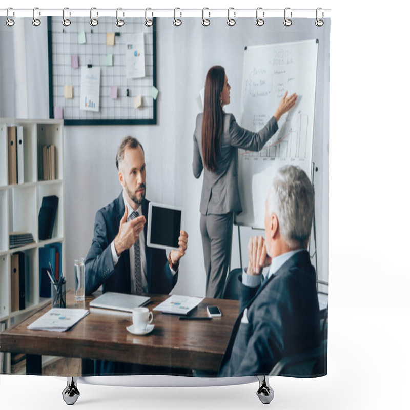 Personality  Businessman Pointing At Digital Tablet Near Colleague, Flipchart And Investor On Blurred Foreground In Office  Shower Curtains