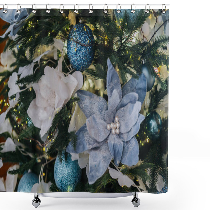 Personality  A Beautifully Decorated Christmas Tree Features Intricate Blue Ornaments And Delicate Flower Accents. The Festive Arrangement Creates A Warm And Inviting Holiday Atmosphere. Shower Curtains