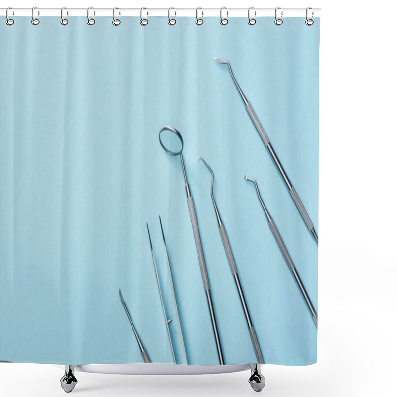 Personality  High Angle View Of Metal Dental Equipment On Blue Background Shower Curtains