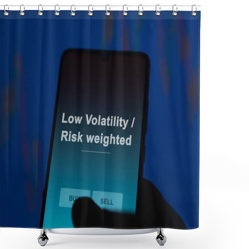 Personality  An Investor Analyzing The Low Volatility / Risk Weighted Etf Fund On A Screen. A Phone Shows The Prices Of Low Volatility / Risk Weighted Shower Curtains