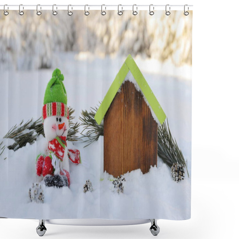 Personality  A Toy Snowman Near Wooden Model Of House Is On The Background Of Winter Landscape. A Concept Of Winter Holiday, Weekend. Shower Curtains