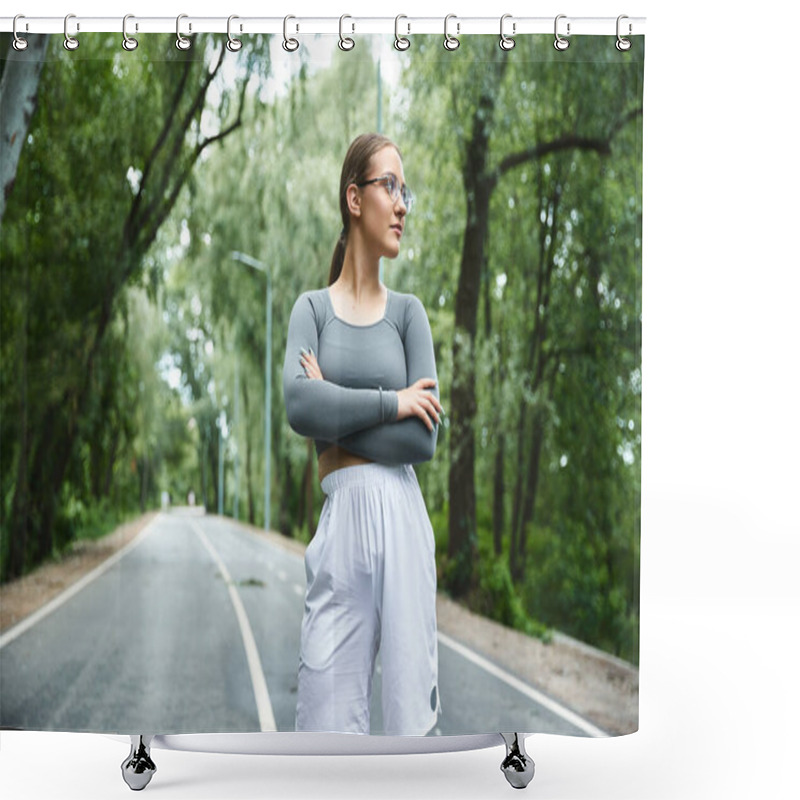 Personality  A Young Woman Confidently Exercises Outdoors, In The Lush Greenery. Shower Curtains