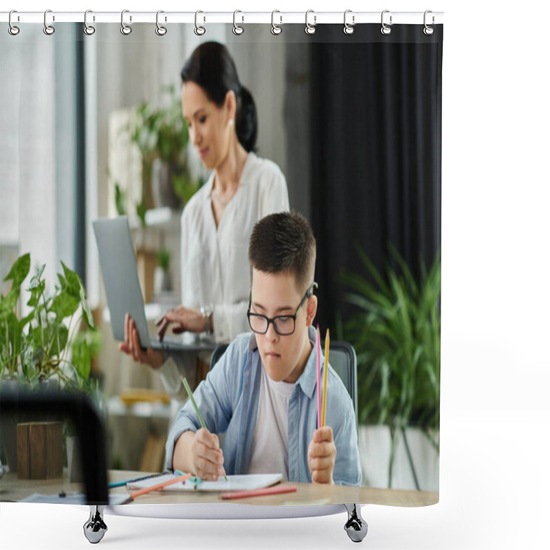 Personality  A Mother Works On Her Laptop While Her Son With Down Syndrome Colors In A Notebook At A Desk. Shower Curtains