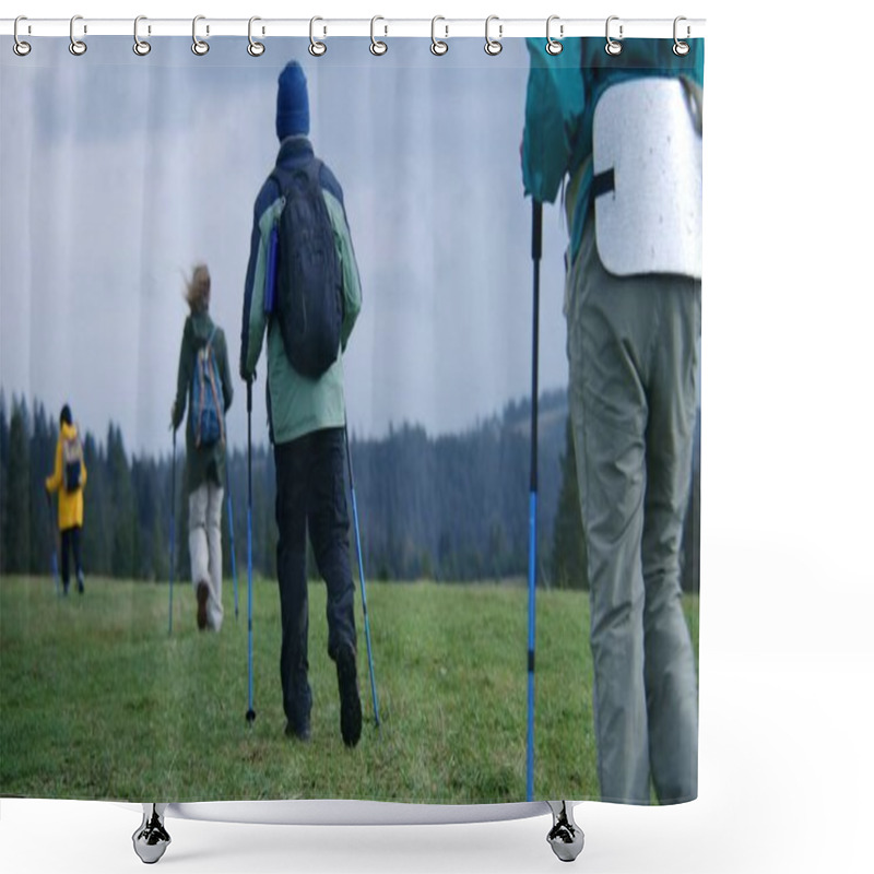 Personality  Group Of Tourists With Backpacks And Trekking Poles Walk Along Trail On Beautiful Mountain Hill. Hikers Discover Amazing Nature Landscapes. Tourism And Active Leisure Concept. Slow Motion. Back View. Shower Curtains