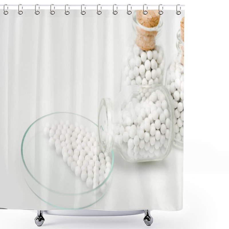 Personality  Selective Focus Of Small Pills In Glass Petri Dish Near Bottles With Wooden Corks Isolated On White  Shower Curtains