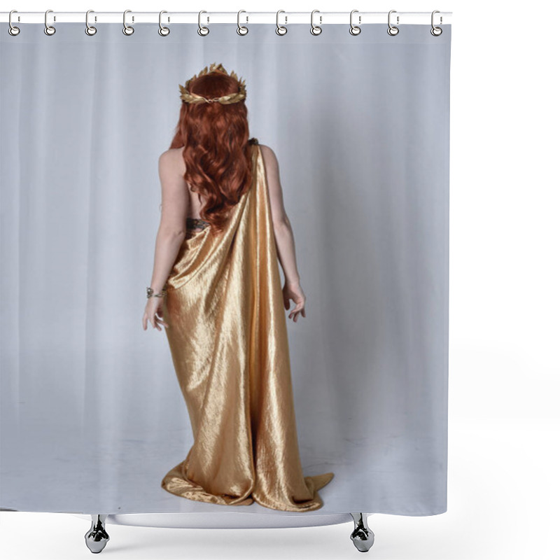 Personality  Full Length Portrait Of Girl With Red Hair Wearing Long Grecian Toga And Golden Wreath. Standing Pose With Back To The Camera,  Isolated Against A Grey Studio Background. Shower Curtains