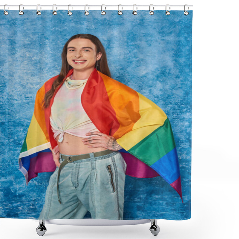 Personality  Happy Long Haired And Tattooed Gay Man In Casual Clothes With Lgbt Flag Posing And Looking At Camera While Celebrating Pride Month On Mottled Blue Background Shower Curtains