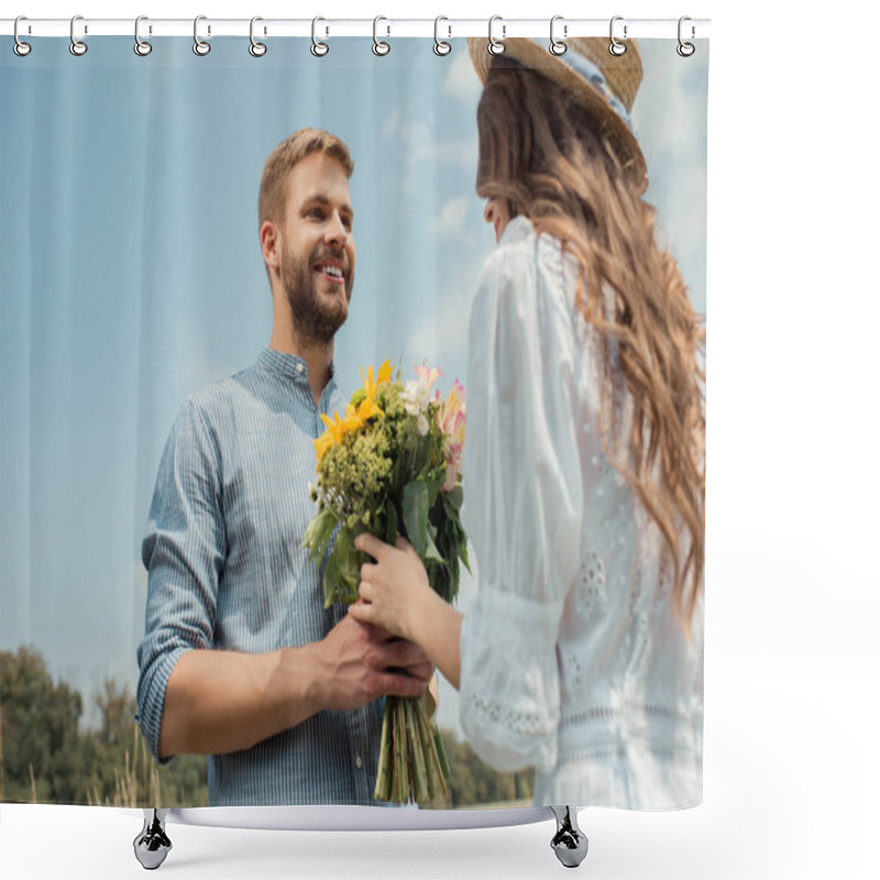 Personality  Low Angle View Of Cheerful Man Presenting Bouquet Of Wild Flowers To Girlfriend With Blue Sky On Background Shower Curtains