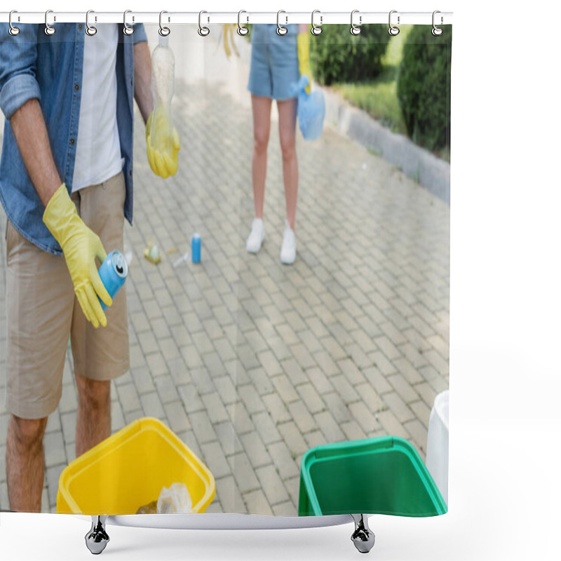 Personality  Cropped View Of Man Holding Garbage Near Trash Can And Blurred Wife On Unban Street  Shower Curtains