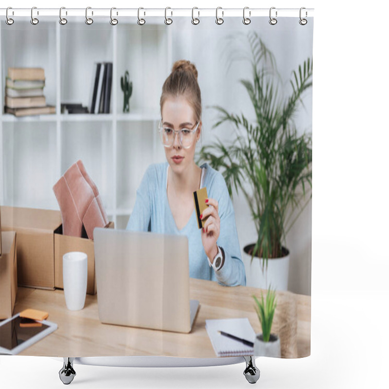 Personality  Portrait Of Focused Woman With Credit Card In Hand Looking At Laptop Screen At Table Shower Curtains