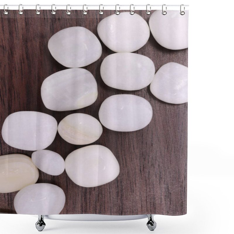 Personality  Tridacna Rare Jewel Stones On Brown Varnished Wood Texture. Sparse Mineral Pebbles Background. Shower Curtains