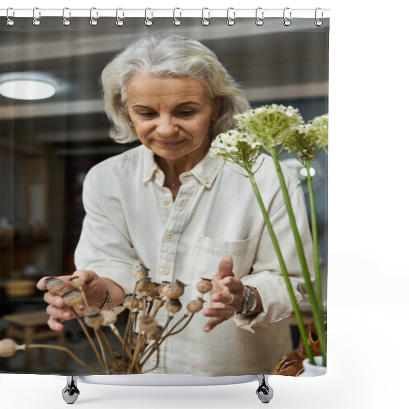 Personality  A Mature Woman Artfully Arranging Dried Floral Stems In A Serene, Warmly Lit Space. Shower Curtains