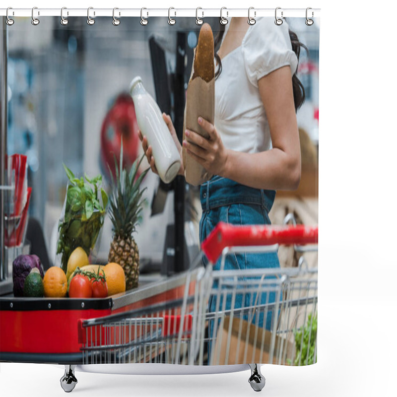 Personality  Cropped View Of Woman Holding Baguette And Glass Bottle With Milk Near Supermarket Counter  Shower Curtains