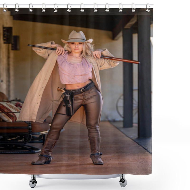 Personality  A Confident, Beautiful Blonde Woman In Classic Cowboy Attire Stands Tall, Posing With A Gleaming Pistol On Her Hip And A Rifle Resting Across Her Shoulder. Her Smile Radiates Energy And Fearless Charm. Shower Curtains