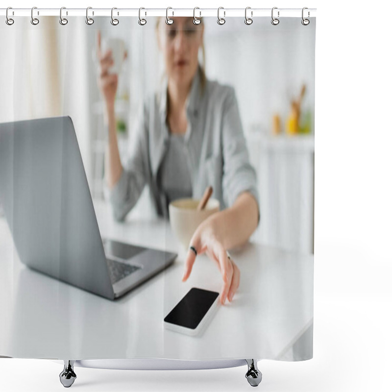 Personality  Blurred Young Woman Holding Cup Of Coffee Near Bowl With Cornflakes During Breakfast While Using Laptop And Reaching Smartphone With Blank Screen In Modern Kitchen, Freelancer, Work From Home  Shower Curtains