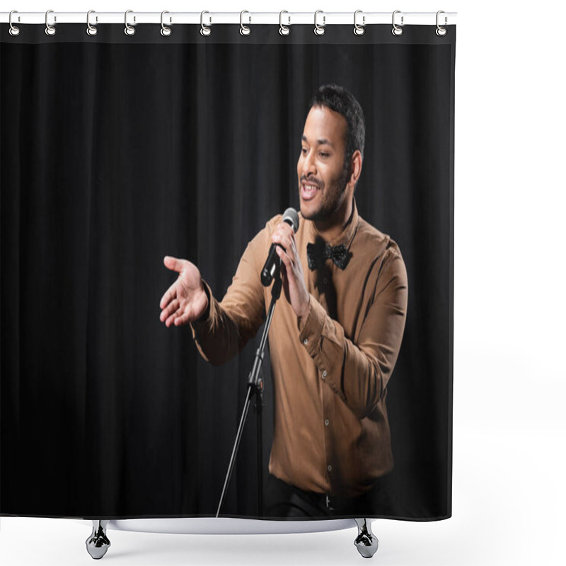 Personality  Indian Comedian Performing Stand Up Comedy And Telling Jokes In Microphone While Gesturing On Black Shower Curtains