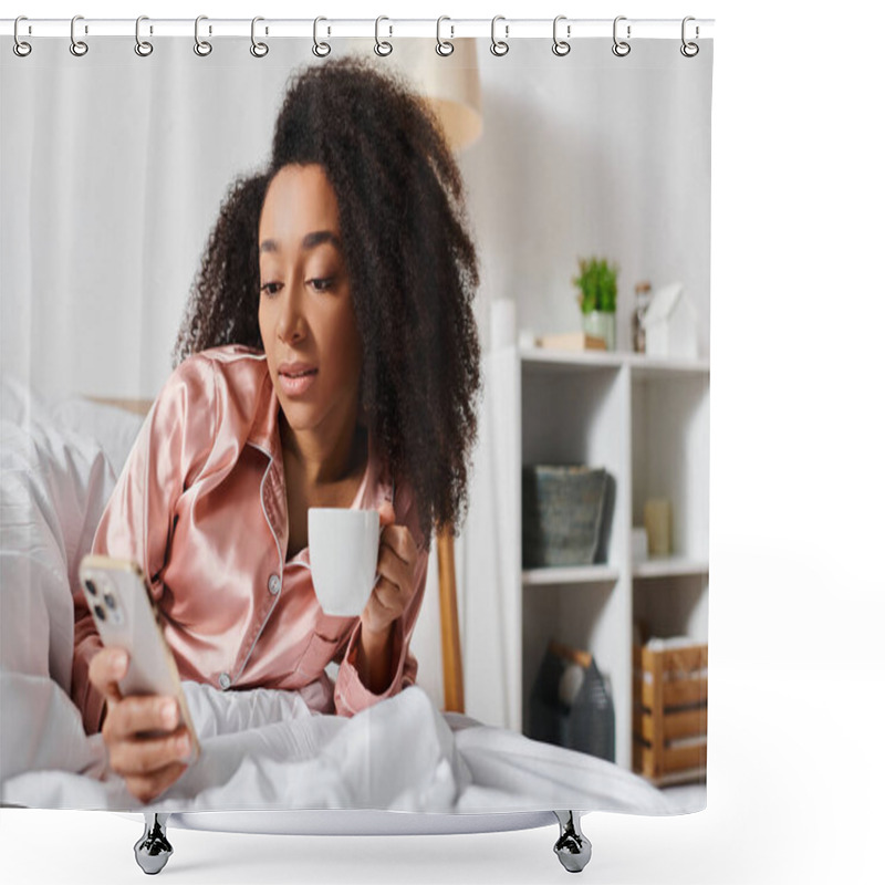 Personality  Curly African American Woman In Pajamas Enjoying Morning Coffee And Checking Her Cell Phone While Relaxing In Bed. Shower Curtains