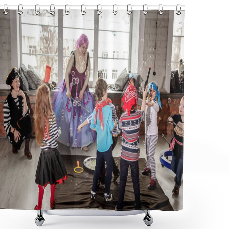 Personality  RUSSIA, YAROSLAVL - 17 FEB. 2018: Happy Group Of Children At A Birthday Celebration Dressed In The Style Of Pirates With An Animator, Contests And Bubbles Play Games In A Large Room With Loft Style Shower Curtains