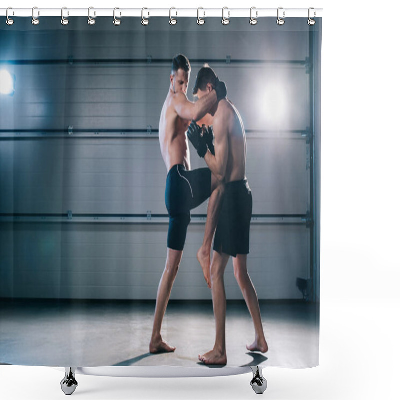 Personality  Side View Of Muscular Mma Fighter Kicking Sportive Opponent In Stomach With Knee Shower Curtains