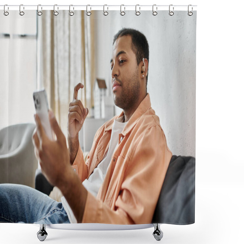 Personality  A Young African American Man Signs With His Hand As He Uses His Smartphone. Shower Curtains