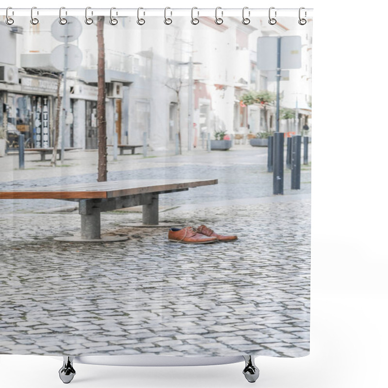 Personality  Brown Leather Shoes On A Cobblestone Pavement Next To A Bench In An Urban Setting. Shower Curtains