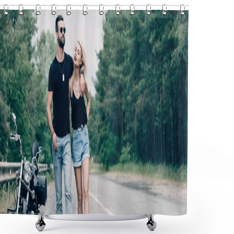 Personality  Young Attractive Couple Of Bikers Walking Along Road And Embracing Near Black Motorcycle, Panoramic Shot Shower Curtains