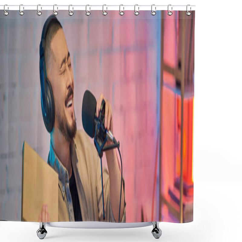 Personality  A Handsome Asian Man Laughs Into A Microphone While Recording A Podcast In His Studio. Shower Curtains